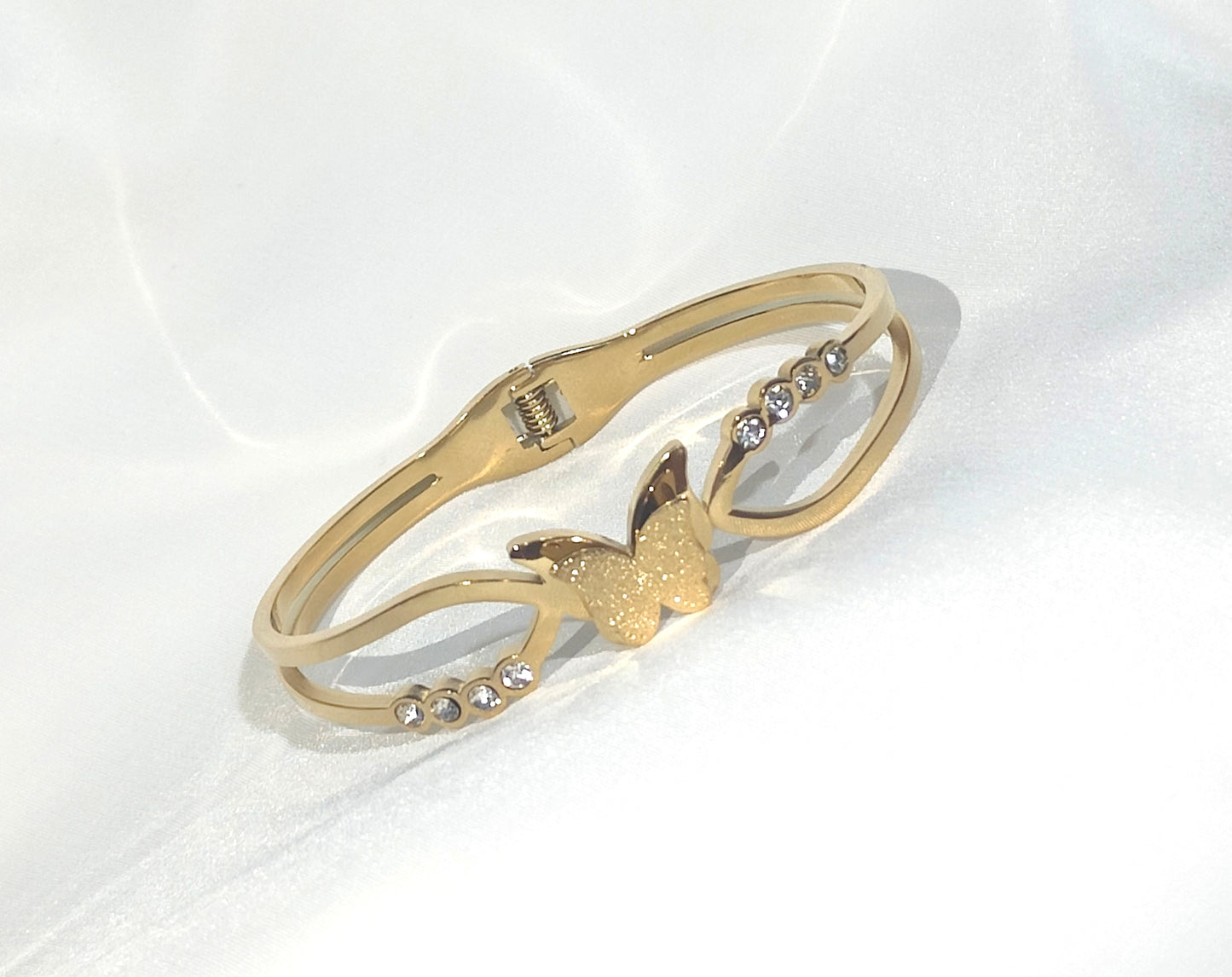 Bracciale rigido a farfalla in acciaio inossidabile