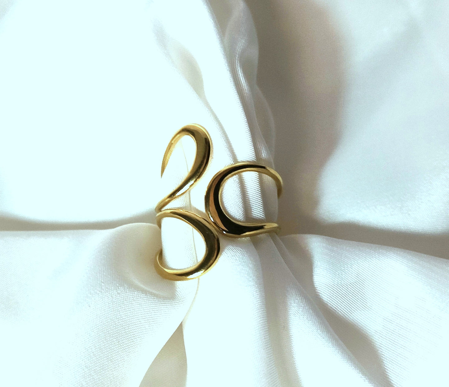 Anello design fluido in acciaio inossidabile