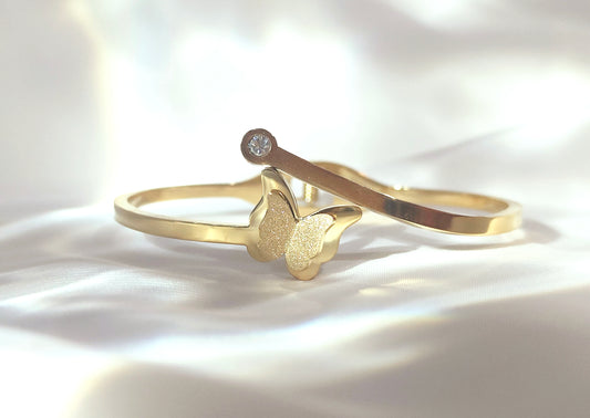 Bracciale rigido a farfalla in acciaio inossidabile