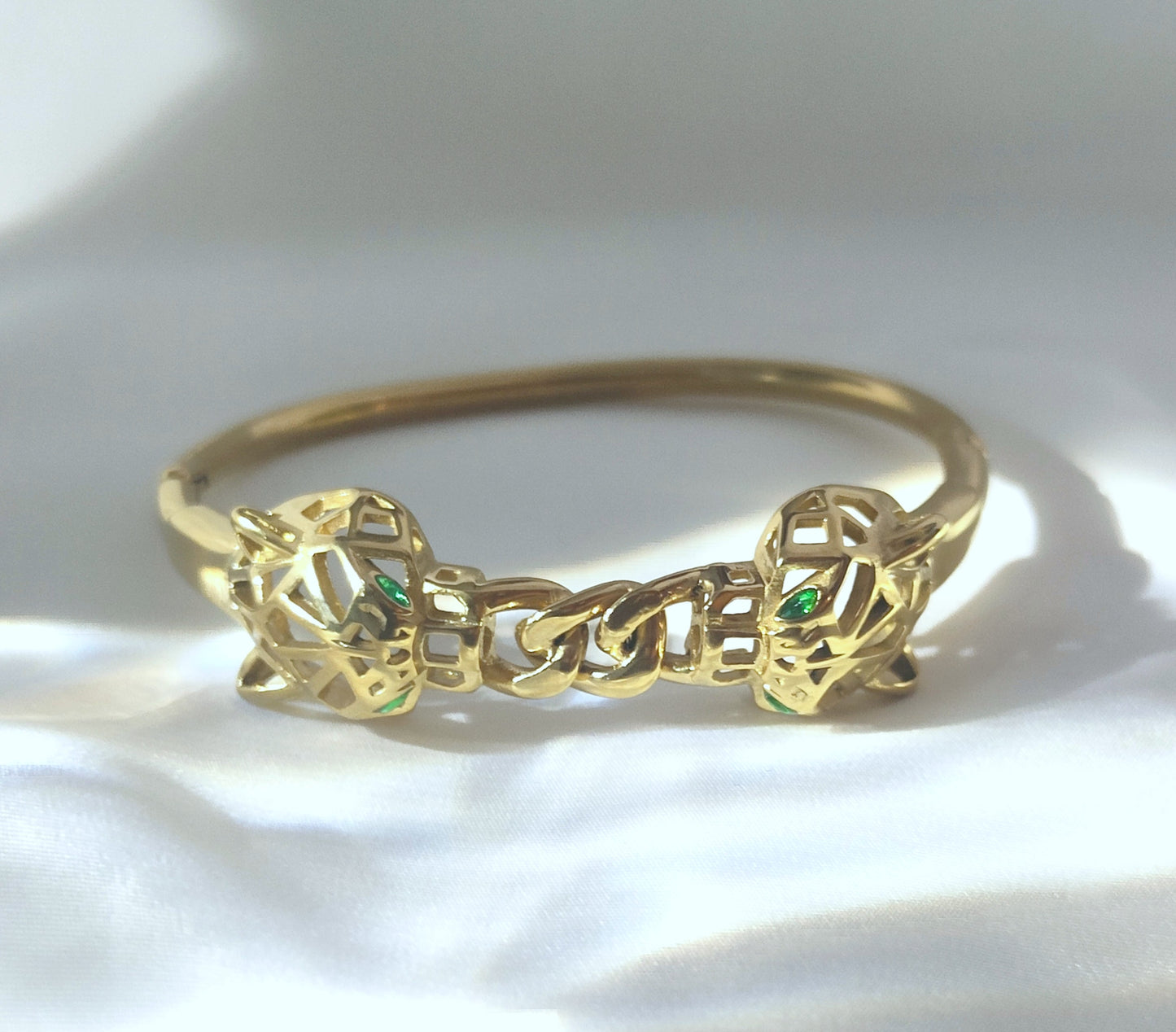 Bracciale rigido doppia pantera intrecciata in acciaio inossidabile oro