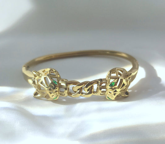 Bracciale rigido doppia pantera intrecciata in acciaio inossidabile oro
