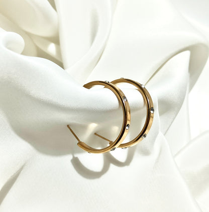 Orecchini design Cartier in acciaio inossidabile