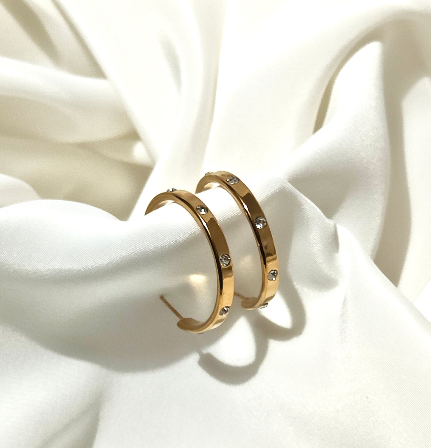 Orecchini design Cartier in acciaio inossidabile
