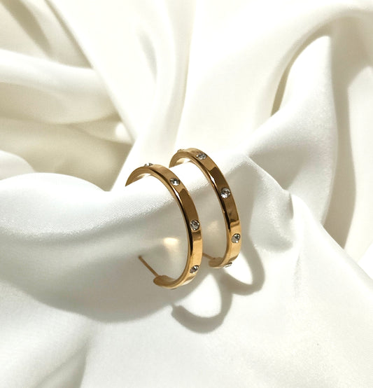 Orecchini design Cartier in acciaio inossidabile