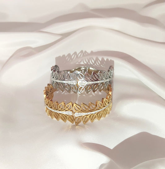 Bracciale rigido a piccoli pitali ai bordi in acciaio inossidabile in due colore: oro e argento