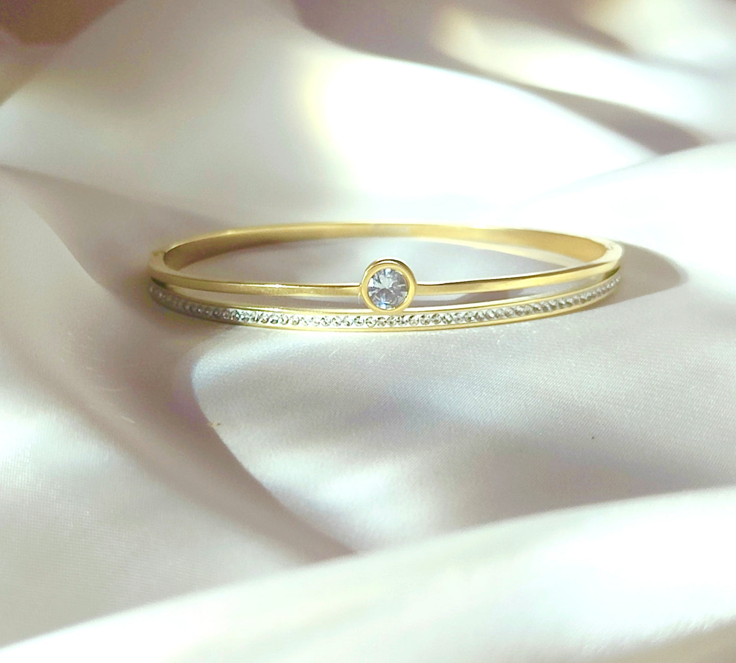 Bracciale Bangle " luce centrale " in  acciaio inossidabile con micro pavé