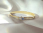 Bracciale bangle bicolore con "mano di fatima" e cristalli  in acciaio inossidabile