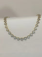 Collana in acciaio inossidabile con cuoricini a strass
