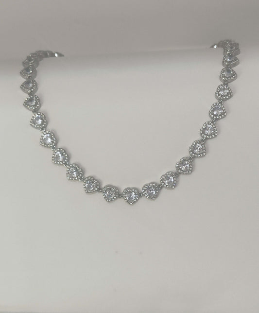 Collana in acciaio inossidabile con cuoricini a strass